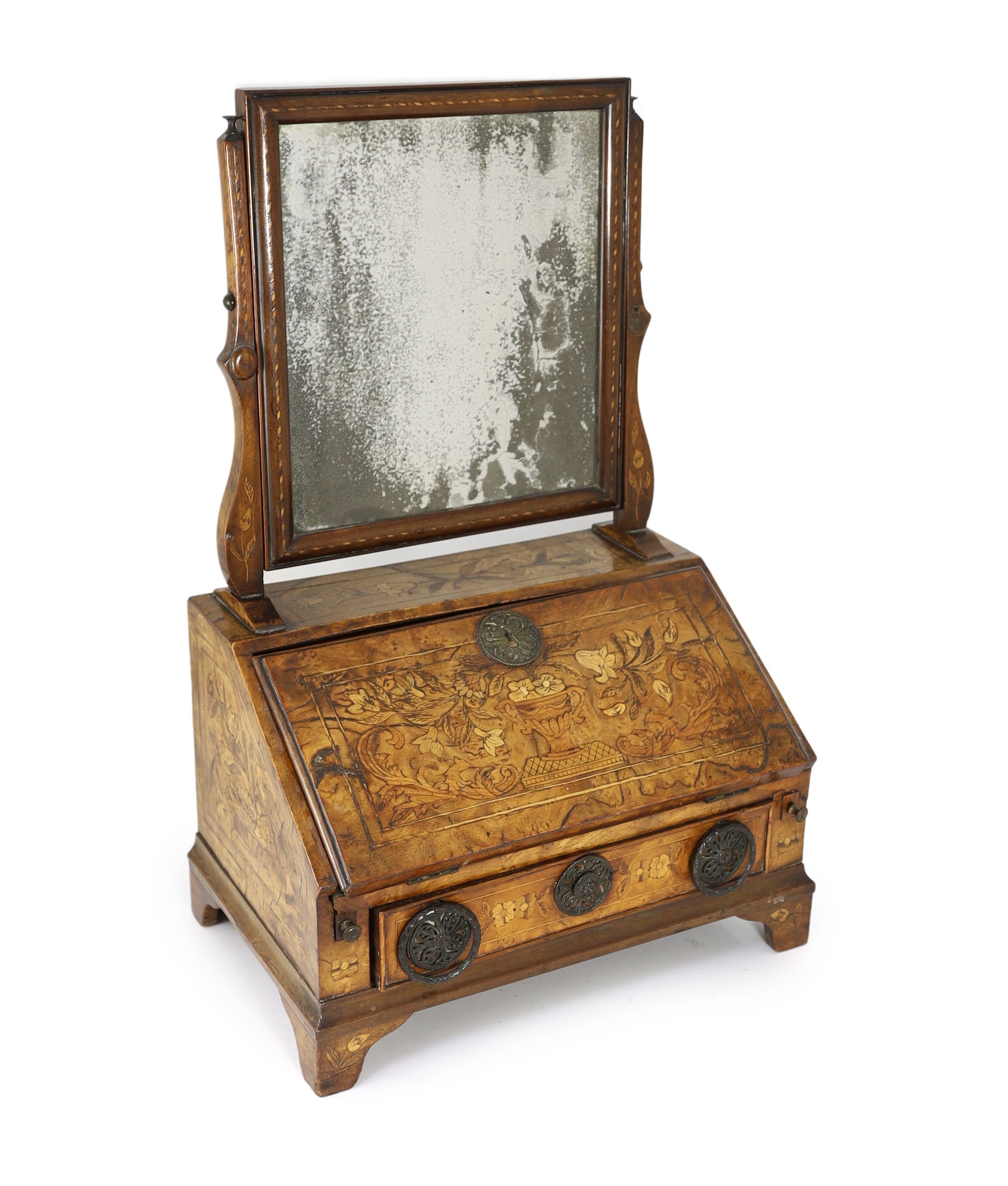 A mid to late 18th century Dutch walnut and marquetry toilet mirror bureau